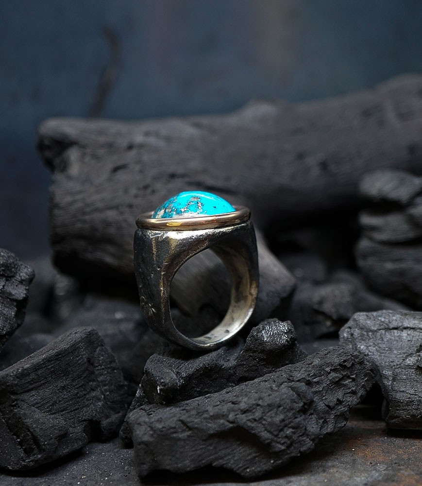 Bague turquoise en or et argent.